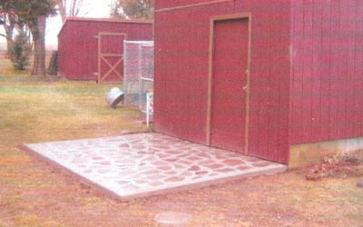 Finished concrete and slate entry way, side view