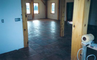Heated tile floor view from hallway (uncleaned after grout)