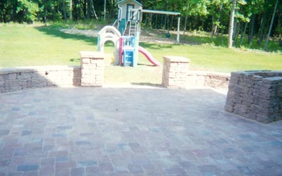 EP Henry, finished circular conventry patio with planters and pillars